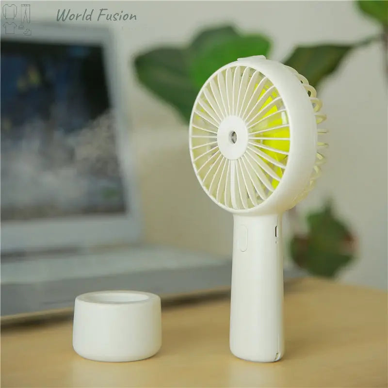 Mini fan mini portable spray World Fusion